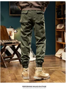 Full back view of men's olive green mountain style cargo joggers with elastic cuffs