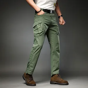 Professional men's green multi-pocket cargo pants with stretch fabric in retro outdoor style