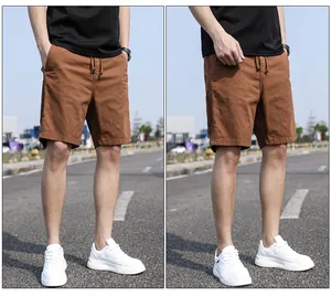 Detailed outdoor view of men's vintage brown cargo shorts featuring a relaxed fit design