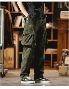 Detailed view of vintage camouflage cargo pants featuring large side pockets