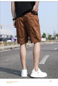 Rear view of men's vintage brown cargo shorts presented in a casual outdoor setting