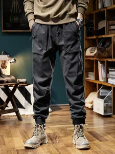 Men's stylish retro winter fleece cargo pants featuring drawstring waist and jogger cuffs