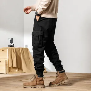 Men's winter loose fleece-lined cargo pants with multi-pockets and elastic cuffs
