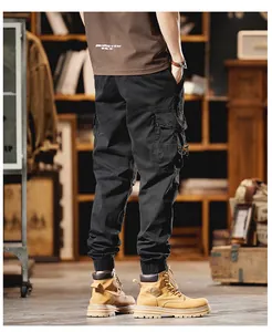 Detailed back view of men's black streetwear cargo joggers featuring multi-pocket design
