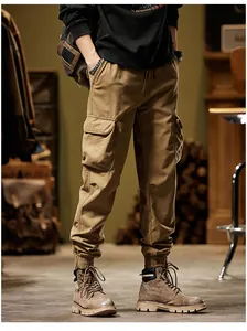 Full-length view of men's American vintage khaki cargo pants with warm fleece lining