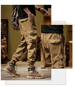 Detailed macro view of durable heavy cotton cargo pants with functional pockets.