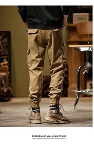 Detailed back view of men's American vintage khaki cargo pants with elasticated jogger cuffs