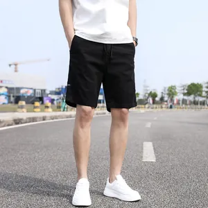 Men's black casual cargo shorts with drawstring waist for a summer outdoor style.