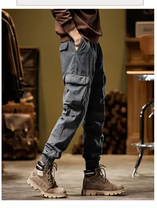 Detail view of men's charcoal grey American vintage cargo pants with side pockets
