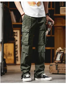 Men's American style army green cargo pants with functional pockets and drawstrings