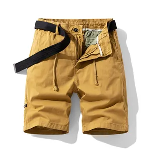 Men's retro mustard yellow cargo shorts with black woven belt and adjustable drawstrings