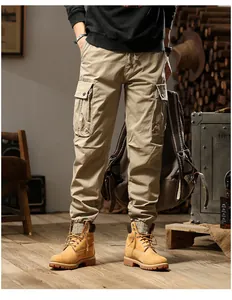 Men's khaki multi-pocket cargo jogger pants with elastic cuffs for a retro street style