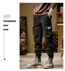 Mens American vintage black cargo pants with side pocket detail for autumn winter wear