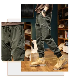 Detailed macro view of these army green cargo pants featuring a side zipper pocket