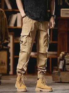 Stylish men's khaki multi-pocket cargo jogger pants in a trendy street fashion design