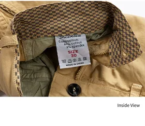 Close-up of khaki shorts interior showing wash tag and cotton lining details
