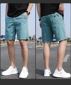 Front and back view of men's loose vintage teal cargo shorts for casual summer wear