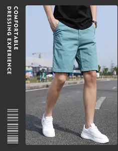 Men's Japanese vintage turquoise cargo shorts styled in a casual street setting