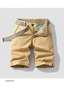 Vintage men's khaki cargo shorts with belt showing premium fabric detail and fit