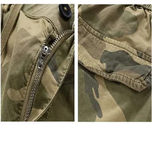 Close-up detail of zipper and pocket flap on durable men's camouflage military cargo shorts