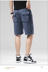 Detail view showing blue men's cargo shorts with functional flap pockets and elastic waistband