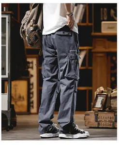 Rear view detail of men's blue straight-leg cargo pants with functional multi-pockets
