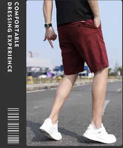 Detail view of men's burgundy retro cargo shorts with comfortable cotton fabric.