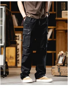 Men's black high street cargo pants with multiple pockets and drawstring detail