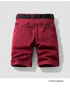 Detailed back view of wine red retro men's cargo shorts with belt and pocket accents