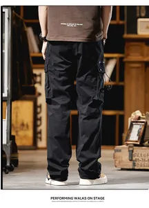 Detailed back view of men's black straight-leg cargo pants featuring utility side pockets