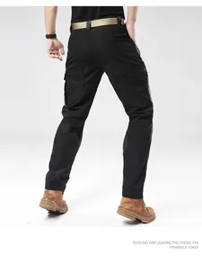 Back view of mens waterproof black tactical cargo pants for hiking and outdoor activities