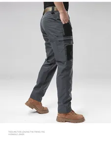 Detail view of men's gray outdoor tactical cargo pants with multi-pocket design