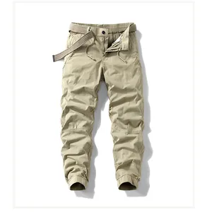 Detailed view of khaki cargo jogger pants for men featuring a belt and drawstring