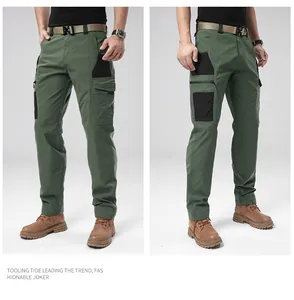 Detailed view of men's olive green outdoor cargo pants with multi-pocket tactical design