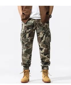 Detail view of men's loose camouflage cargo pants with jogger cuffs