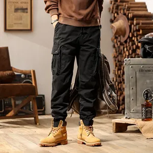 Men's vintage black multi-pocket tapered cargo pants for outdoor street style