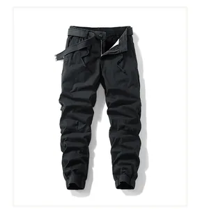 Detail view of black men's elastic cargo jogger pants with adjustable belt and drawstring
