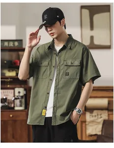 Detailed view of olive green retro cargo shirt with dual chest pockets for men