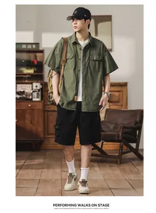 Japanese style men's olive green workwear short sleeve shirt featuring multi-pockets