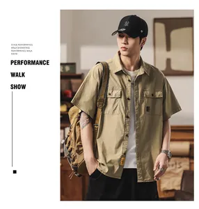 Retro khaki short-sleeved workwear shirt for men featuring a Japanese style multi-pocket design