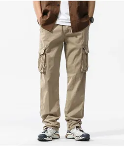 Detail view of men's loose khaki cargo pants with functional side pockets.