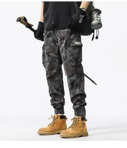 Men's dark camouflage cargo jogger pants designed for outdoor hiking and tactical style