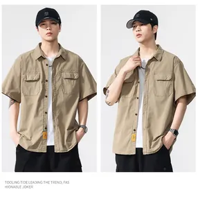 Men's khaki short-sleeve work shirt featuring double chest pockets and retro style