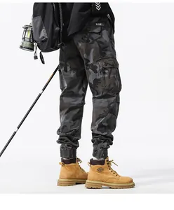 Detailed back view of men's camouflage cargo pants with side pockets and cuffed ankles