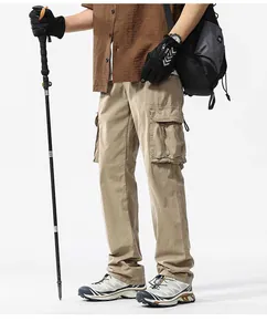 Men's retro multi-pocket cargo pants in khaki with relaxed fit for outdoor adventures