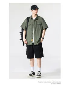 Men's retro Japanese style short sleeve cargo shirt with double chest pockets in olive green.