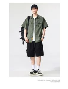 Full view of men's retro Japanese style olive green work shirt with multi-pocket design