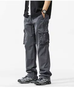 Detailed macro view of men's vintage grey heavyweight multi-pocket loose cargo pants