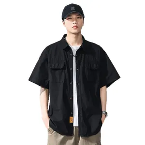 Men's black cargo short sleeve shirt with chest pockets and button down front
