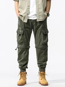 Vintage olijfgroene functionele cargo broek voor heren met zakken en jogger boorden